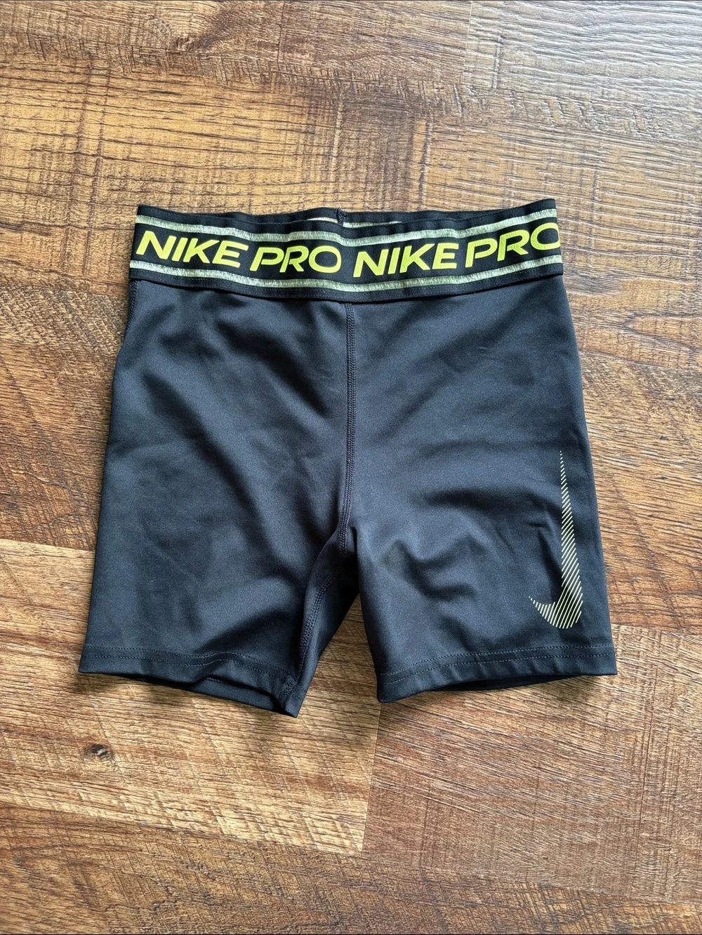 NWOT Nike Black Compression Shorts with Yellow Waistband